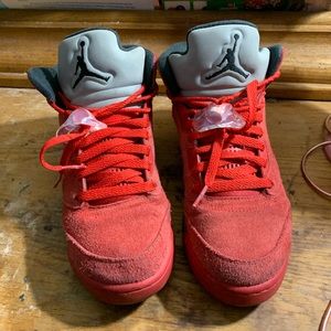 Red suede jordan 5s